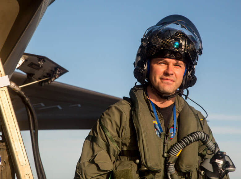 F-35 pilot carrying helmet